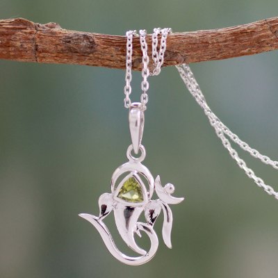 Peridot pendant necklace, 'Mystical Ganesha' - Women's Sterling Silver and Peridot Yoga Jewelry