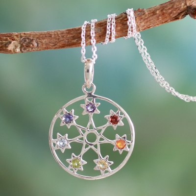 Garnet and amethyst pendant necklace, 'Chakra Stars' - Fair Trade 7 Stone Silver Chakra Necklace