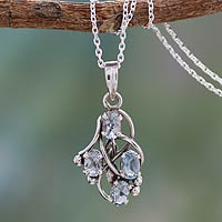 Blue topaz pendant necklace, 'Twirling' - Blue Topaz and Sterling Silver Necklace India Jewelry