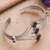 Garnet cuff bracelet, 'Glamour' - Modern Sterling Silver and Faceted Garnet Cuff Bracelet thumbail