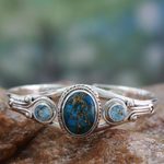 Blue topaz cuff bracelet, 'Azure Heavens' - Handmade Blue Topaz Bracelet with Composite Turquoise