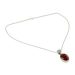 Carnelian pendant necklace, 'Radiant Facets' - Artisan Made Silver and Carnelian Necklace