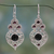 Onyx and garnet dangle earrings, 'Delhi Hope' - Fair Trade Onyx and Garnet Sterling Silver Dangle Earrings thumbail