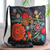 Embroidered cotton blend shoulder bag, 'Tropical Paradise' - Floral Embroidery on Black Cotton Blend Shoulder Bag thumbail