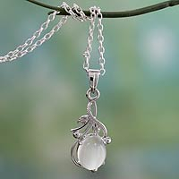 Moonstone pendant necklace, 'Surreal Treasure' - Fair Trade Moonstone and Sterling Silver Necklace