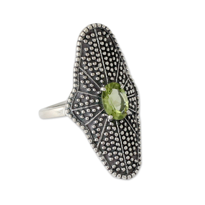 Peridot cocktail ring, 'Starlight Love Expression' - Fair Trade Cocktail Ring with Peridot and Oxidized Silver