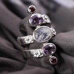 Multi-gemstone cocktail ring, 'Spiral Enchantment' - Silver Moonstone Artisan Ring with Amethyst and Garnet
