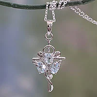 Featured review for Blue topaz cross pendant necklace, Precious Trinity