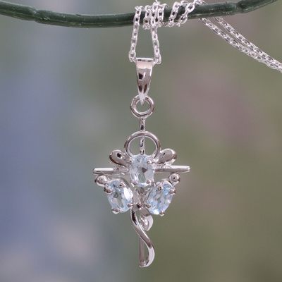 Blue topaz cross pendant necklace, 'Precious Trinity' - Cross Pendant Necklace with Blue Topaz Gems