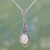 Rainbow moonstone pendant necklace, 'Moonlight Radiance' - Handcrafted Moonstone Sterling Silver Necklace thumbail