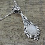 Rainbow moonstone pendant necklace, 'Moonlight Radiance' - Handcrafted Moonstone Sterling Silver Necklace