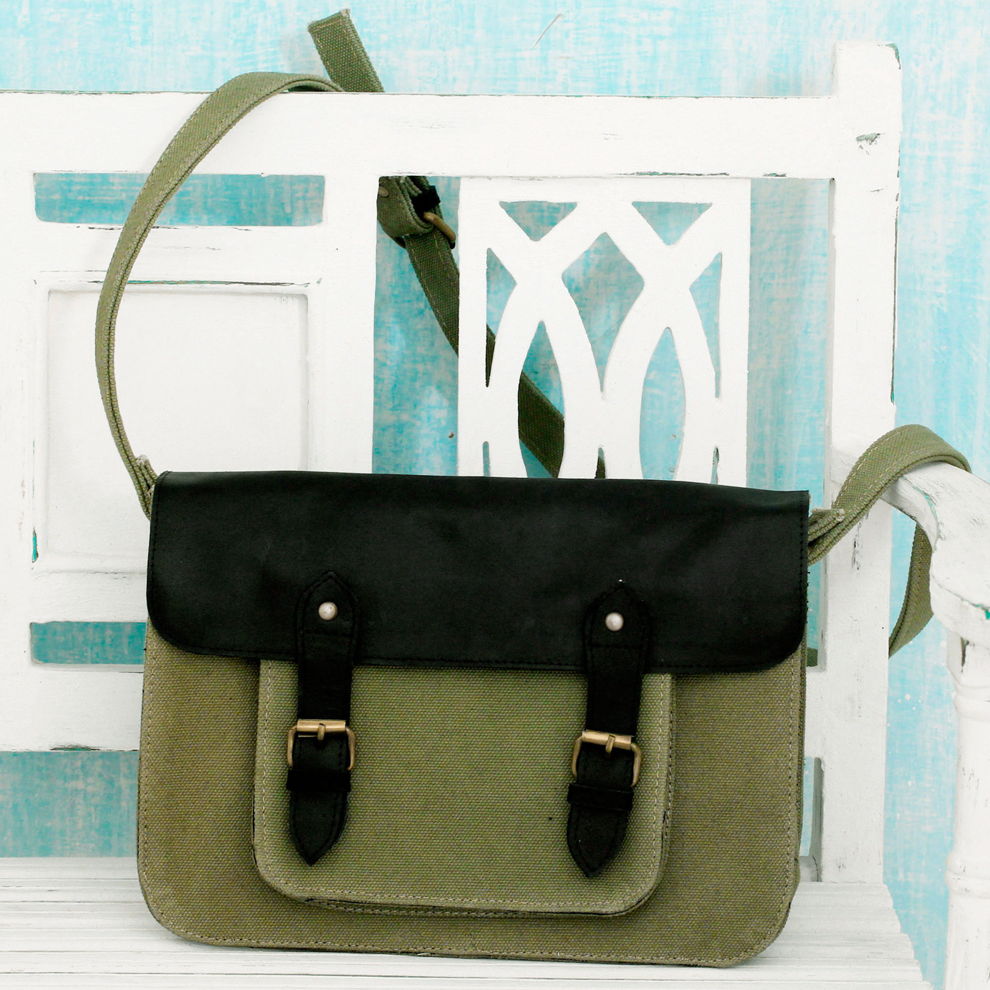 green canvas messenger bag