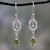 Peridot dangle earrings, 'Lime Knot' - Silver and Peridot Dangle Earrings Crafted in India thumbail