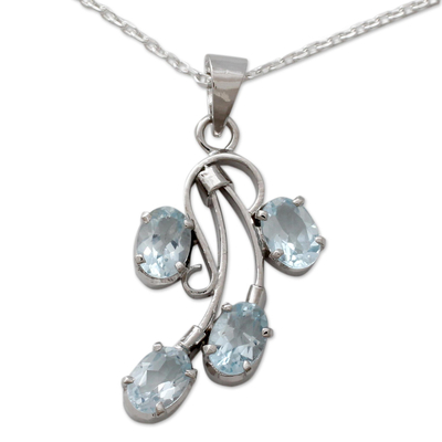Blue topaz pendant necklace, 'Fidelity' - Polished Sterling Silver and Blue Topaz Pendant Necklace