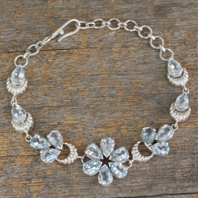 Blue topaz link bracelet, 'Mystic Petals' - Sterling Link Bracelet with 12 Carats of Blue Topaz Stones