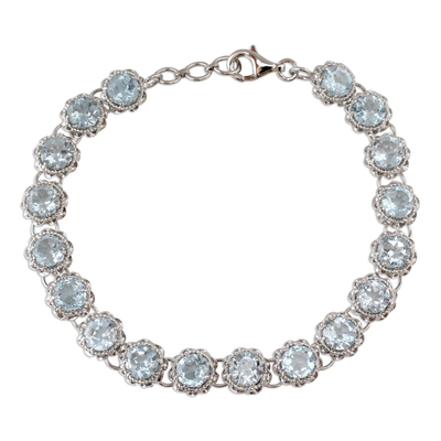 Tennis Bracelet with Blue Topaz Set in Sterling Silver