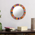 Wood wall mirror, 'Festive Holi' - Colorful Mango Wood Wall Mirror Hand Crafted in India thumbail