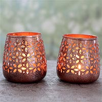 Steel tealight holders, 'Flower Glow' (pair) - Pair of Copper Plated Steel Floral Tealight Candle Holders