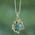 Citrine pendant necklace, 'Golden Forest Mist' - Handmade Composite Turquoise and Citrine Necklace