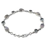 Rainbow moonstone and blue topaz link bracelet, 'Misty Sky' - Blue Topaz and Rainbow Moonstone Gemstone Station Bracelet