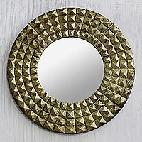 Brass wall mirror, 'Circling Pyramids' - Antiqued Embossed Brass Circular Wall Mirror from India