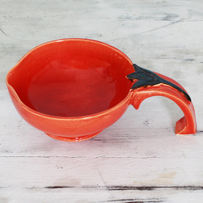 Ceramic bowl, 'Trishul' - Handmade Glazed Ceramic Engraved Orange Bowl from India