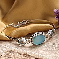 Blue topaz and chalcedony pendant bracelet, 'Shining Blue'