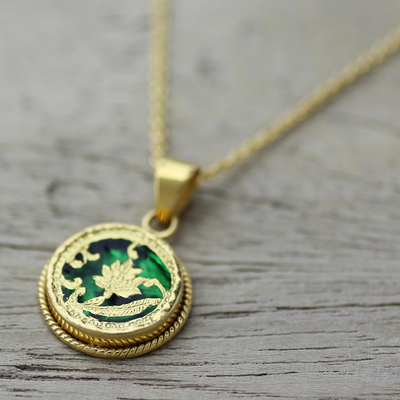 Gold plated pendant necklace, 'Leafy Circle in Green' - Gold Plated Thewa Glass Leafy Pendant Necklace from India
