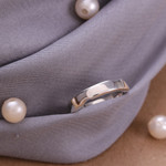 Garnet band ring, 'Curvy Sophistication in Red' - Sterling Silver and Garnet Band Ring from India