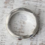 Garnet band ring, 'Curvy Sophistication in Red' - Sterling Silver and Garnet Band Ring from India