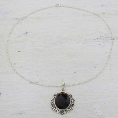 Onyx pendant necklace, 'Floral Midnight Allure' - Sterling Silver and Faceted Onyx Floral Necklace from India