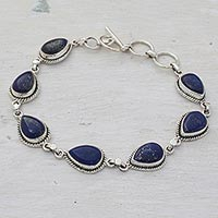 Lapis lazuli link bracelet, 'Caressing Rain in Blue' - Lapis Lazuli and Sterling Silver Link Bracelet from India