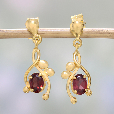 Gold plated garnet dangle earrings, 'Red Twist' - 22k Gold Plated Garnet Dangle Earrings by Indian Artisans