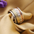 Sterling silver meditation spinner ring, 'Floral Sheen' - Sterling Silver Copper and Brass Indian Floral Spinner Ring (image 2) thumbail