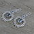 Blue topaz dangle earrings, 'Regal Circles' - Blue Topaz and Sterling Silver Dangle Earrings from India