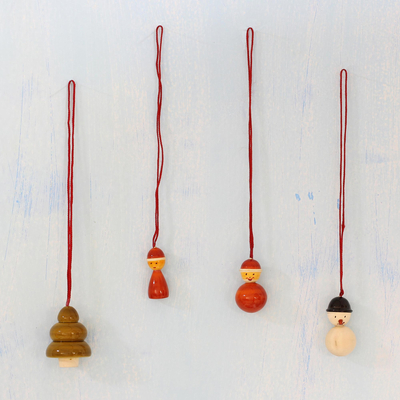 Wood ornaments, 'Jolly Christmas' (set of 4) - Set of Four Wood Christmas Ornaments by Indian Artisans
