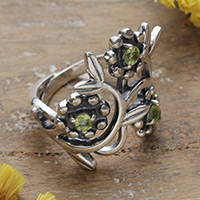 Peridot cocktail ring, 'Floral Glimmer' - Floral Peridot and Sterling Silver Cocktail Ring from India