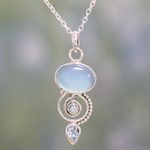 Blue topaz and chalcedony pendant necklace, 'Sentimental Journey' - Blue Topaz and Chalcedony Pendant Necklace from India