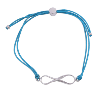 Sterling silver pendant bracelet, 'For Ever and Ever in Sky Blue' - Sterling Silver Infinity Bracelet in Sky Blue from India
