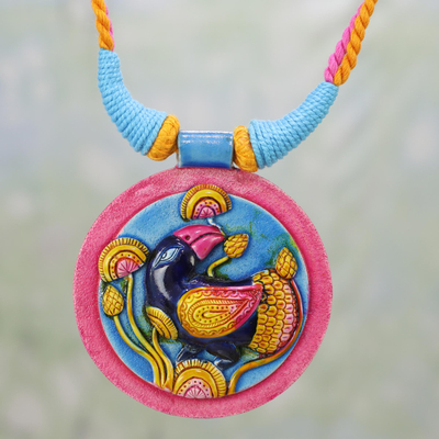 Ceramic pendant necklace, 'Nightingale Song' - Colorful Ceramic and Cotton Bird Pendant Necklace from India