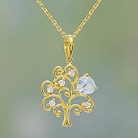 Gold plated blue topaz pendant necklace, 'Golden Tree' - Gold Plated Blue Topaz Tree Pendant Necklace from India