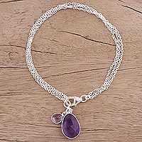 Amethyst charm bracelet, 'Twinkling Harmony' - Amethyst and Sterling Silver Charm Bracelet from India
