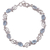 Blue topaz link bracelet, 'Blue Shimmer' - Blue Topaz Rhodium Plated Sterling Silver Link Bracelet thumbail