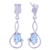 Rhodium plated blue topaz dangle earrings, 'Beauty Swirls' - Rhodium Plated Blue Topaz Dangle Earrings from India