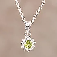 Rhodium plated peridot pendant necklace, 'Gleaming Flower' - Peridot and CZ Rhodium-Plated Sterling Silver Necklace