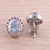 Rhodium plated blue topaz button earrings, 'Radiant Rays' - Rhodium Plated Blue Topaz Button Earrings from India