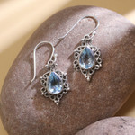Blue topaz dangle earrings, 'Blue Intricacy' - Sterling Silver and Blue Topaz Dangle Earrings from India