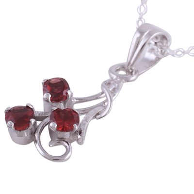 Garnet pendant necklace, 'Twirling Radiance' - Rhodium Plated Garnet Pendant Necklace from India