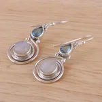 Blue topaz dangle earrings, 'Blissful Fusion' - Moonstone and Blue Topaz Sterling Silver Earrings from India
