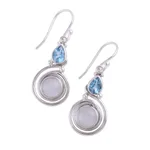 Blue topaz dangle earrings, 'Blissful Fusion' - Moonstone and Blue Topaz Sterling Silver Earrings from India